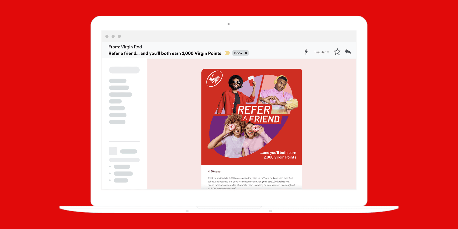 A laptop showing an email from Virgin Red with an offer for free coffee