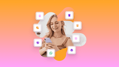 a woman is smiling while looking at her cell phone