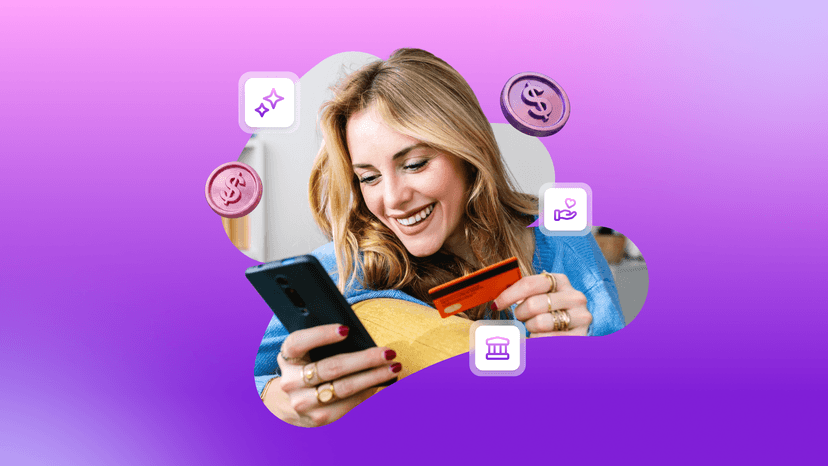 a woman holding a credit card