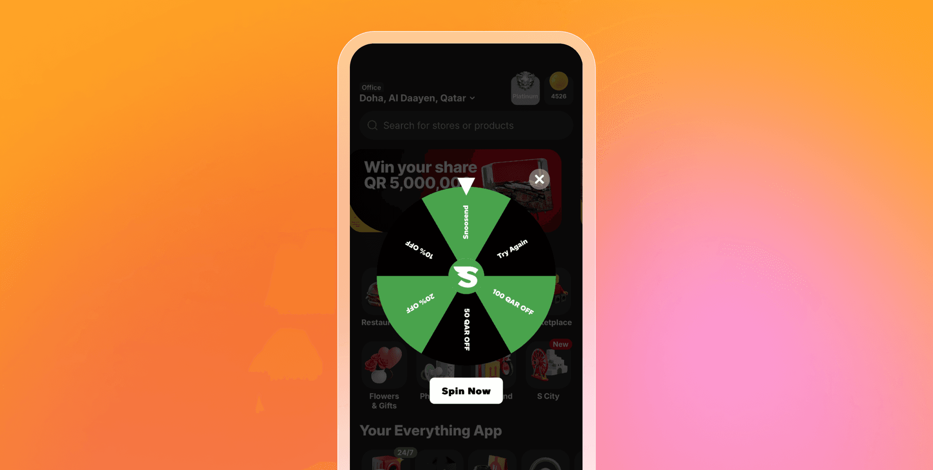 a phone screen shows a spinning wheel that says spin now