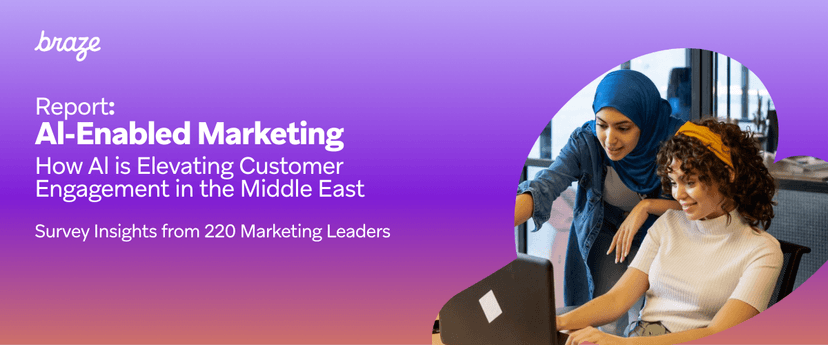Braze report cover: "AI-Enabled Marketing" on AI elevating customer engagement, featuring two women collaborating on a laptop.